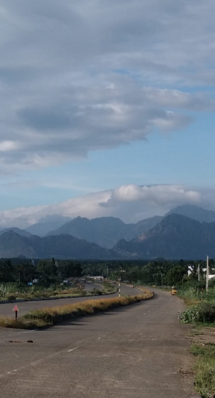 Picture of a mountain covered in clouds